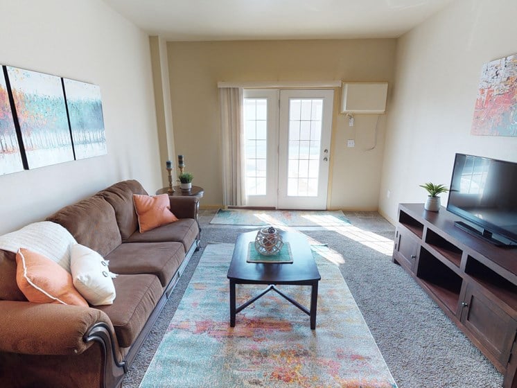 living room, furnished, patio door